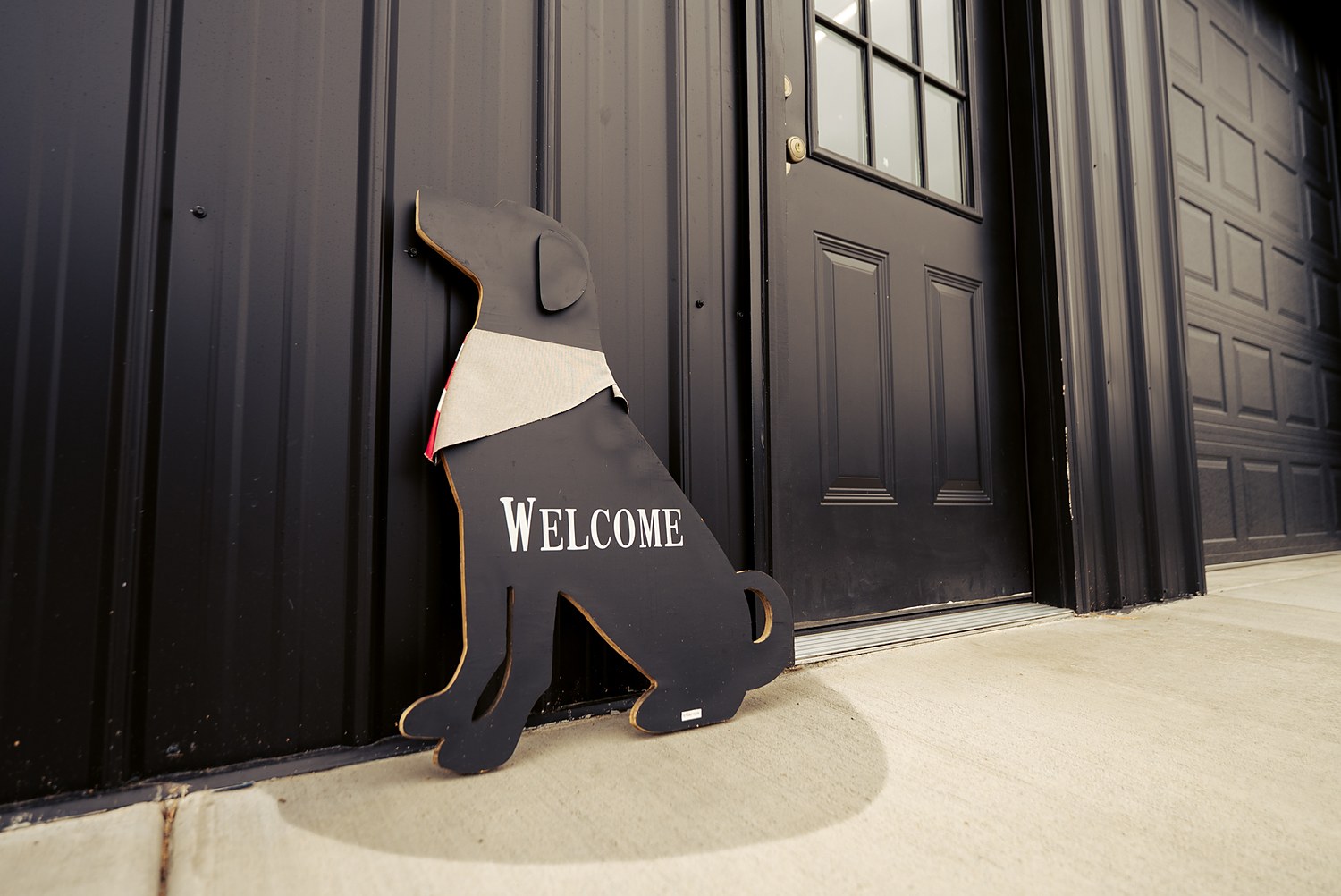 The welcome sign at the barn door